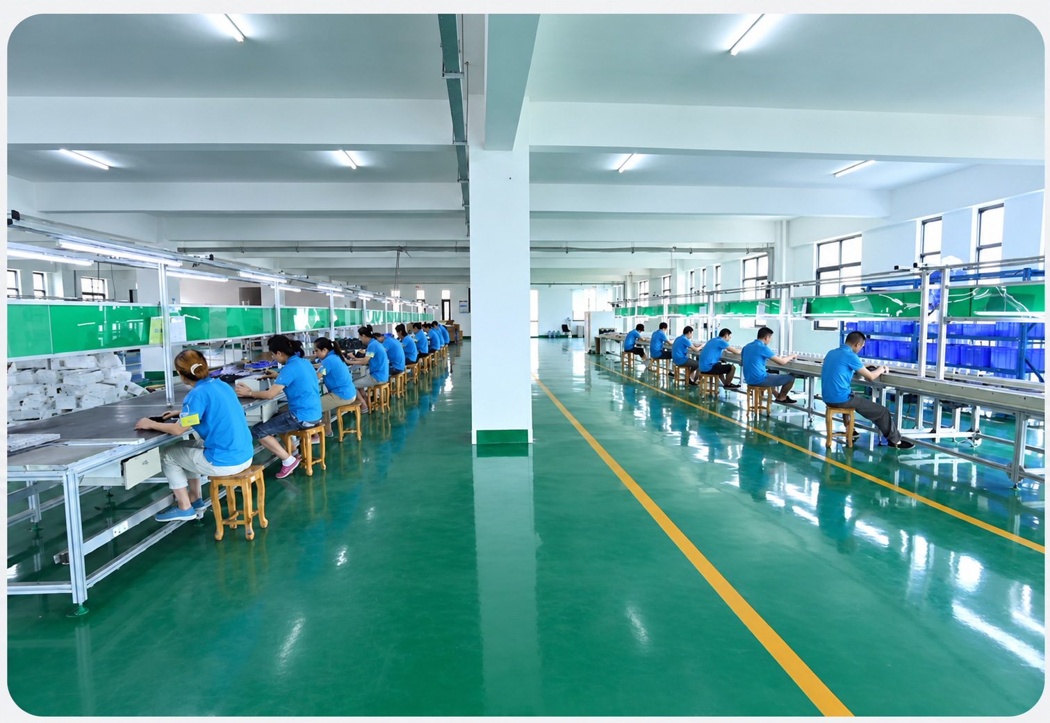Manufacturing team at the assembly lines; original brand photo enhanced for clarity